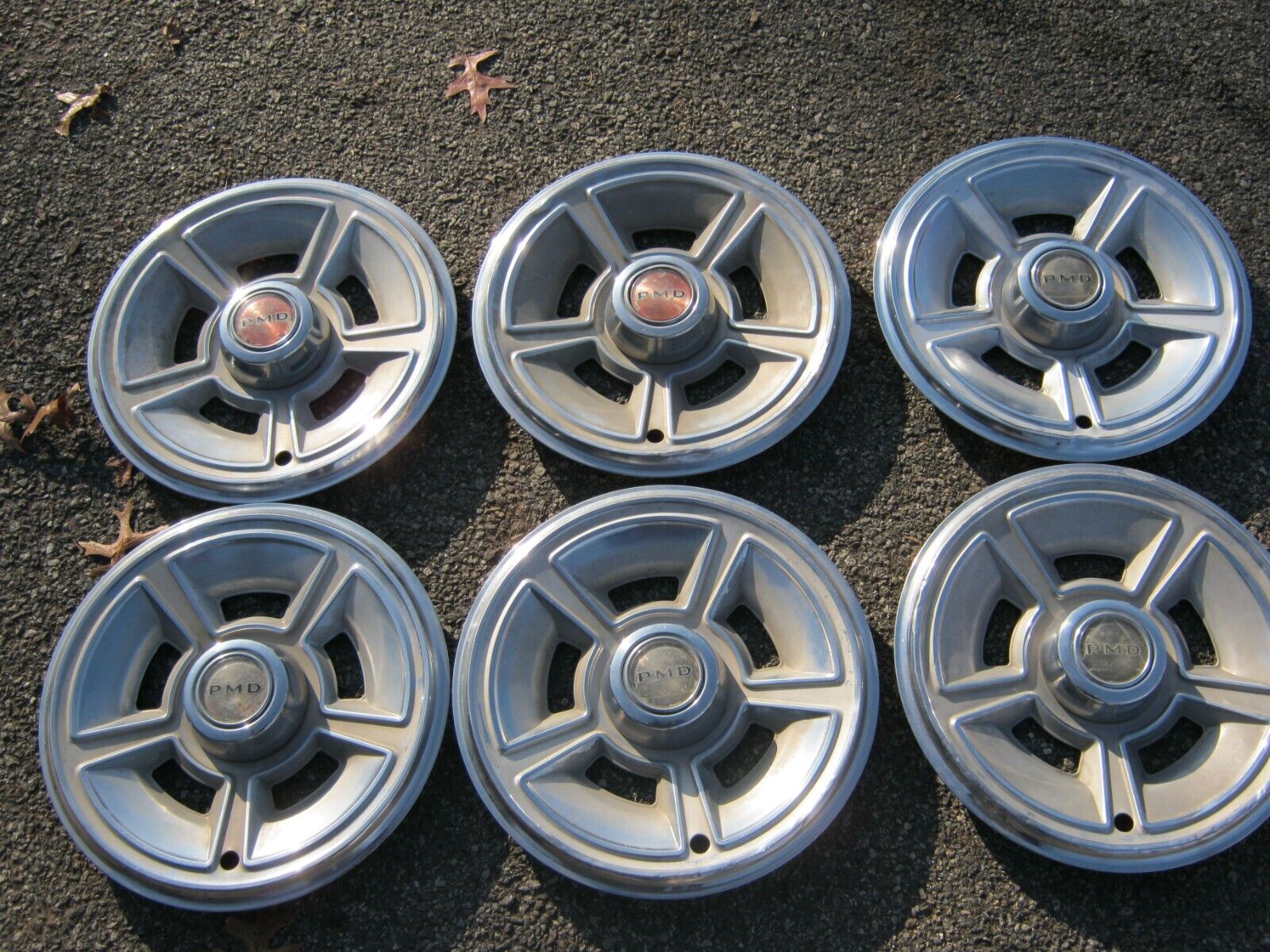 Factory original 1969 Pontiac Firebird Tempest 14 inch hubcaps wheel covers
