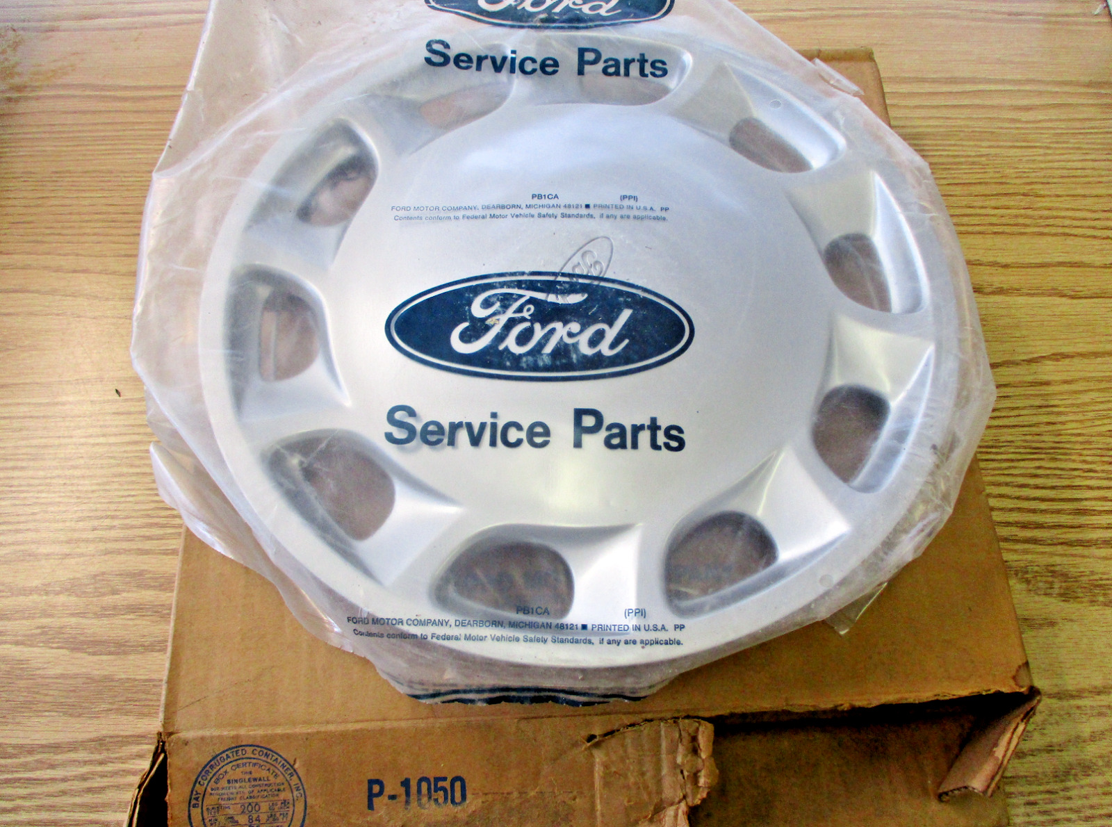 One factory NOS 1991 1992 Ford Escort 13 inch hubcap wheel cover new