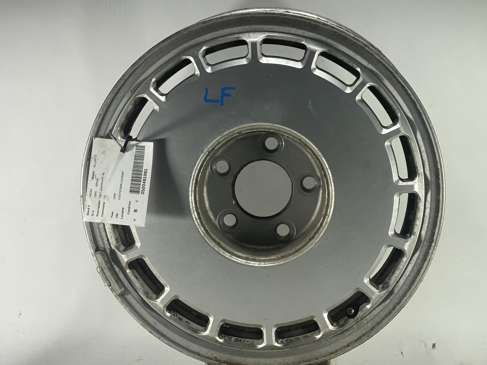 Used Wheel fits: 1990 Cadillac Allante 16x7 aluminum Grade B