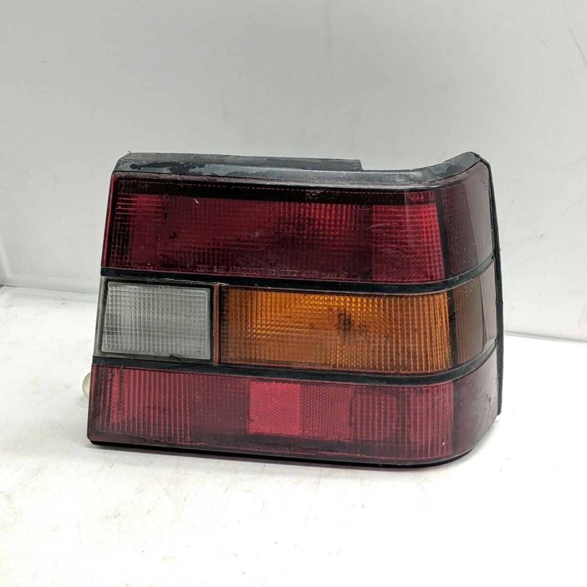 Chevrolet 1985-86 Geo Spectrum RH Passenger Red White Amber Tail Light Assembly