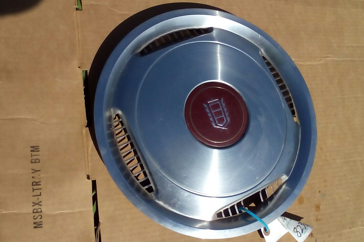 one 1983 to 1986 Ford LTD hubcap wheel cover