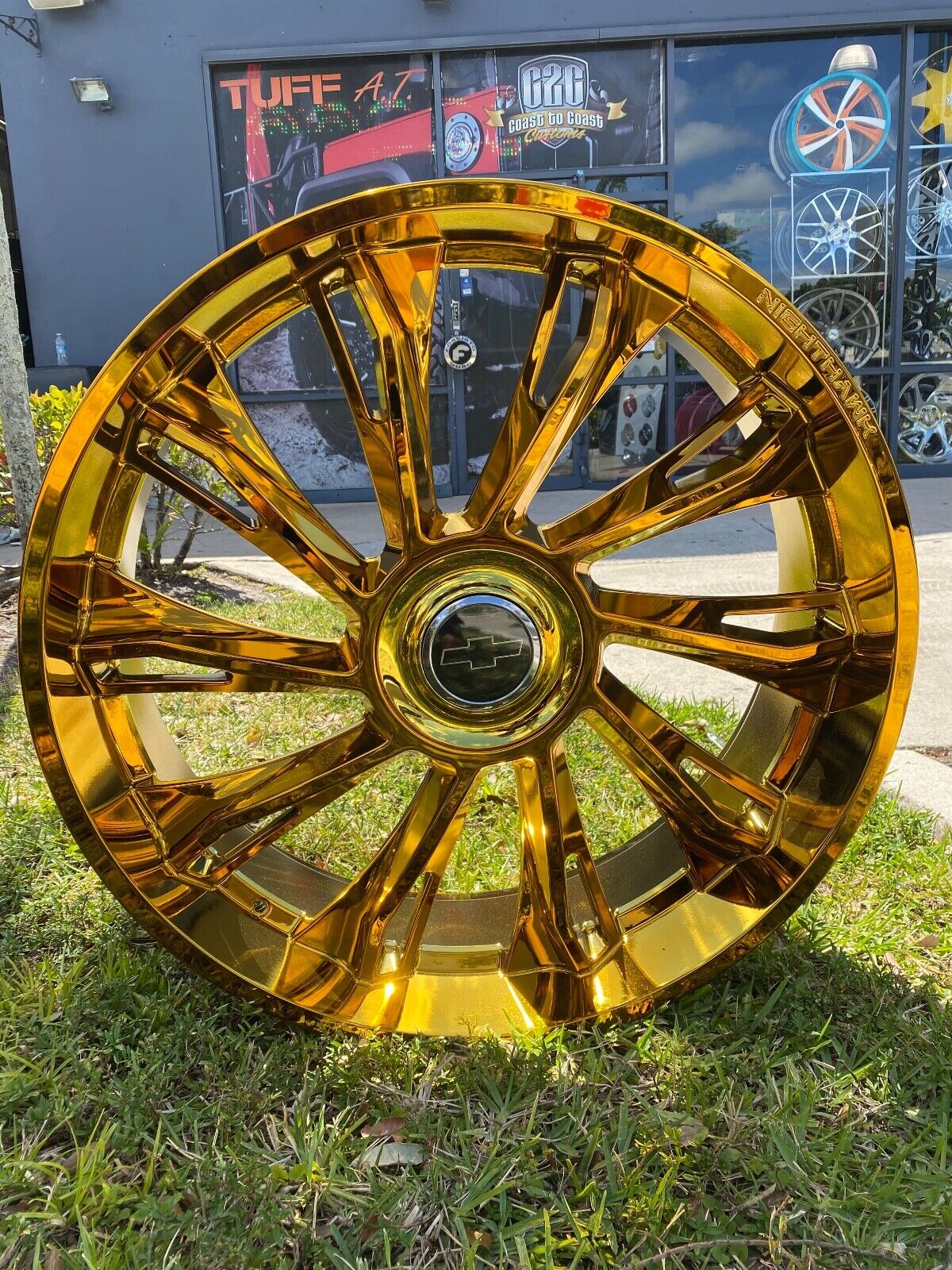 26x9.5 SET OF 4 WHEELS Gold Nighthawk 6x135/139.7 Floating Caps With Tires