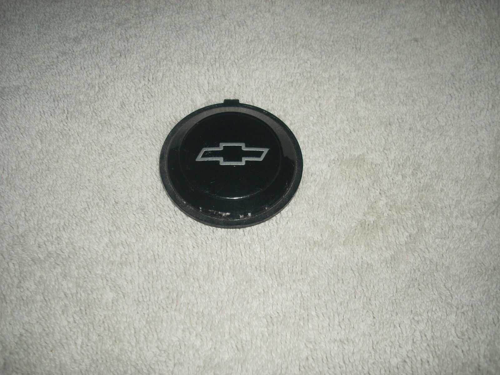 1990-1994 Chevy Lumina silver on black bowtie steering wheel horn cap emblem OEM
