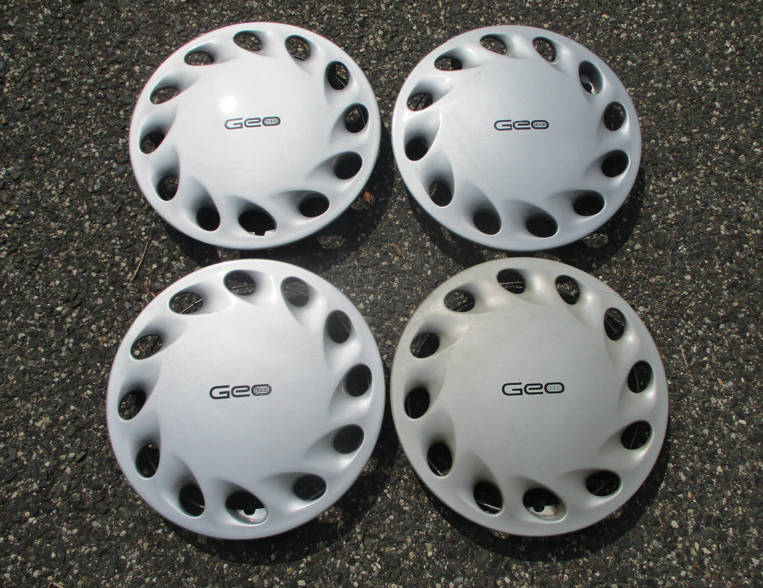 Factory 1992 to 1994 Geo Metro 12 inch hubcaps wheel covers 