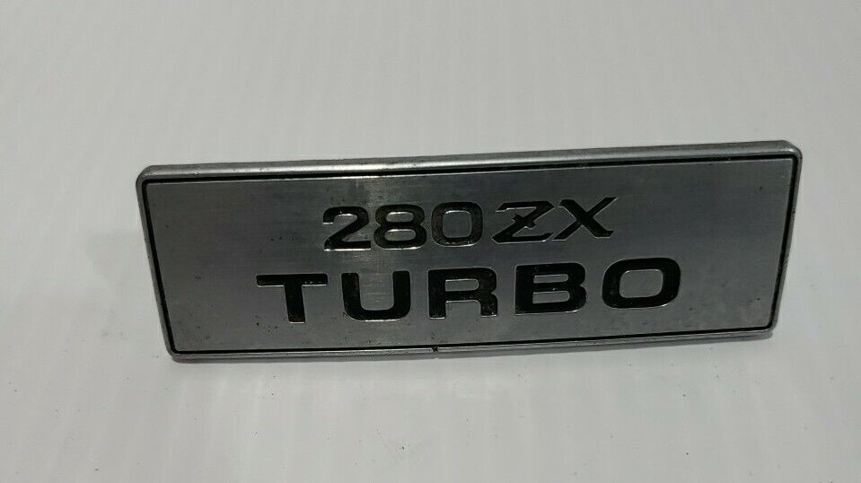 1982-83 Datsun 280ZX Turbo Manual Shifter Bezel Badge 96948P9000