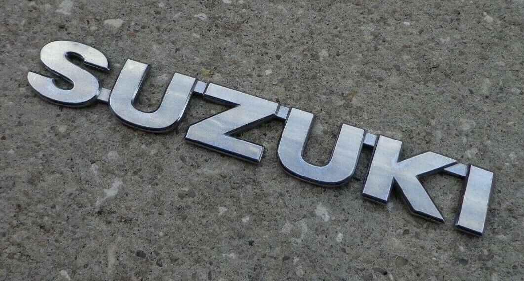 Suzuki emblem badge decal logo Aerio Vitara SX4 Forenza OEM Genuine Stock chrome