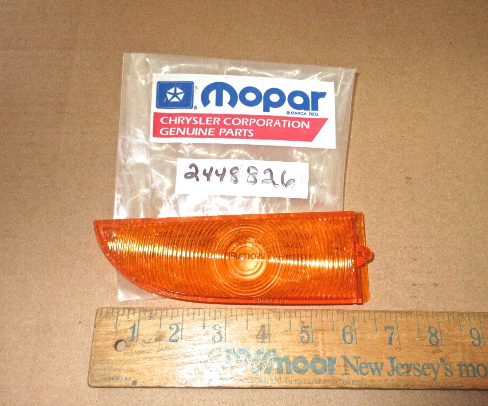 NOS Mopar 2448826 left park lamp lens, amber 1964 1965 Plymouth Valiant