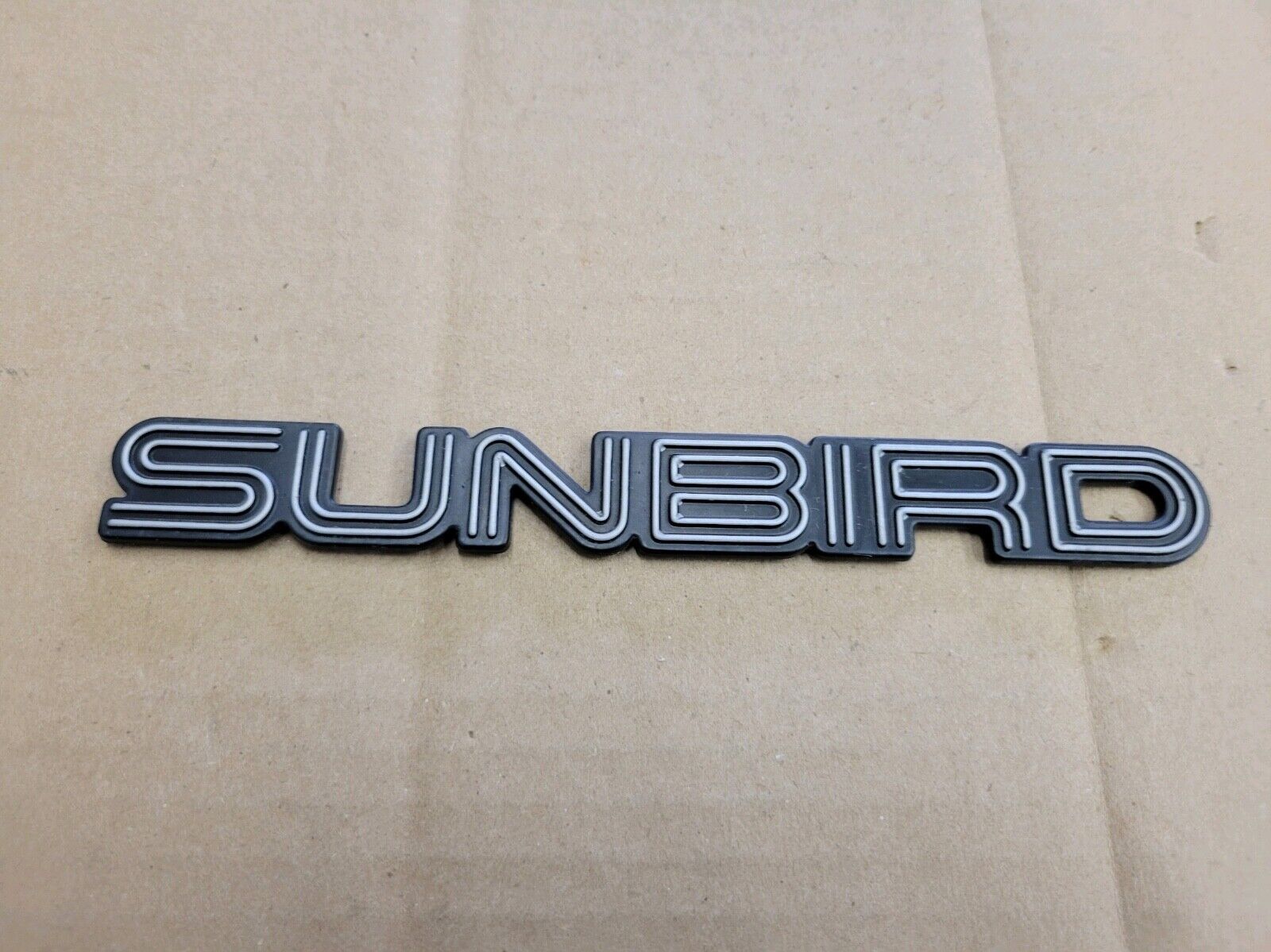 Pontiac OEM Sunbird Front Door Side Emblem Badge Logo Nameplate Name Plate