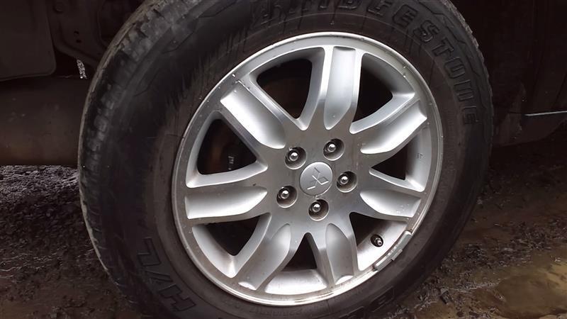 Used Wheel fits: 2011 Mitsubishi Endeavor 17x7 alloy 7 spoke Grade A