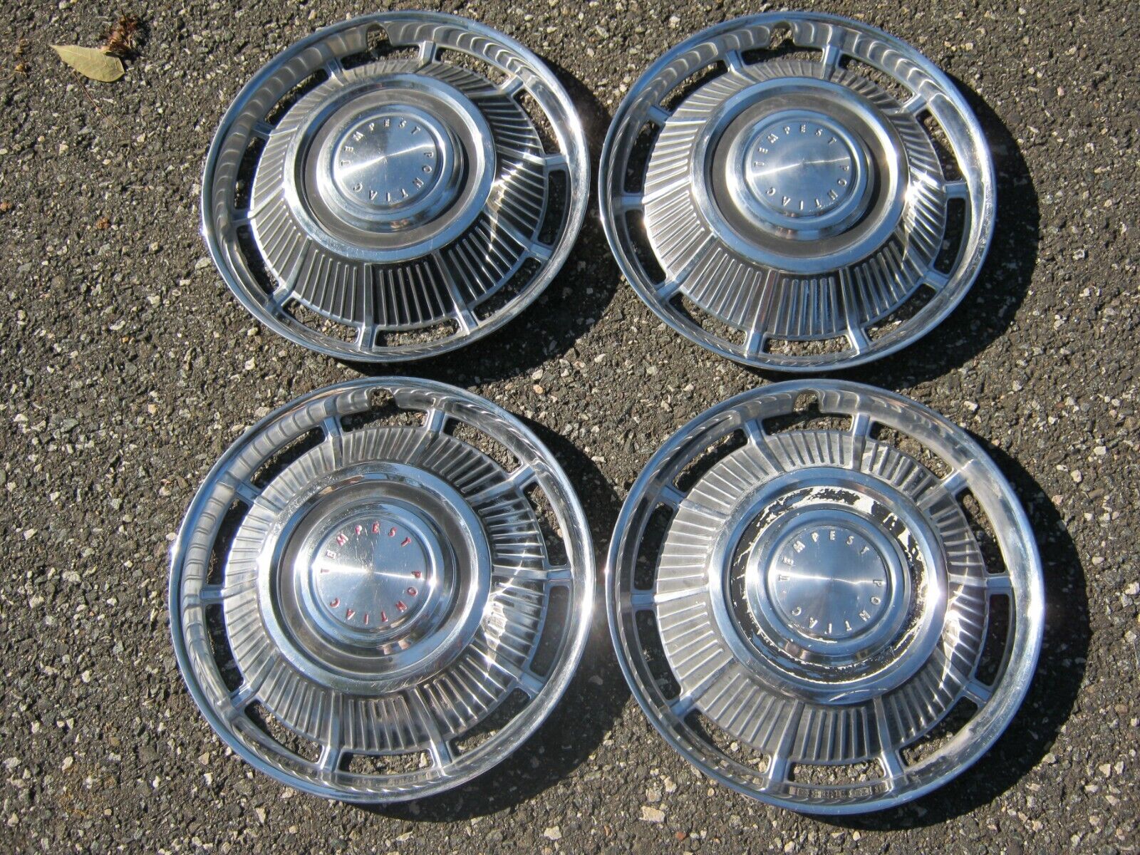 Factory original 1961 to 1963 Pontiac Tempest 15 inch hubcaps wheel covers