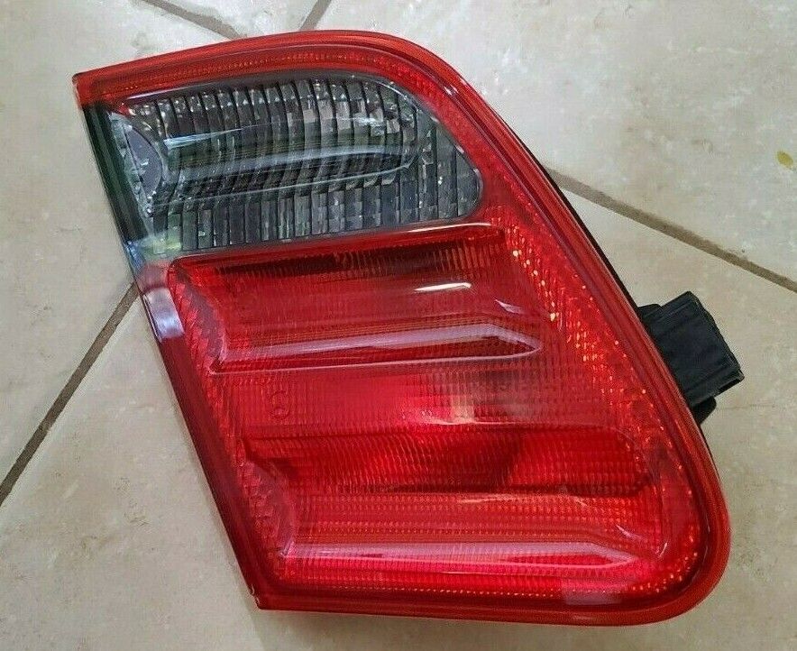 MERCEDES W210 96-02 E55 AMG NEW GENUINE LEFT TAIL TRUNK LID SMOKED LENS LIGHT