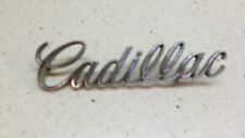 NOS 9834648 1974-1975 Cadillac DeVille Front Header Panel Script Nameplate picture