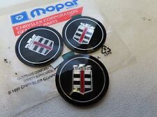 (3) New Mopar OEM NOS 1977 - 1981 Dodge Diplomat hubcap center cap emblems badge picture