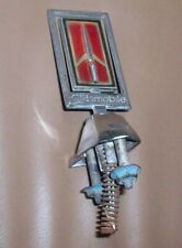 1980 80 Oldsmobile Delta 88 Royale Ninety Eight Hood Header Ornament 22504120 picture