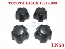 BLACK CENTER WHEEL CAP NO CLIP LOCK FOR TOYOTA HILUX LN50 PICKUP MK2 1984 - 1988 picture