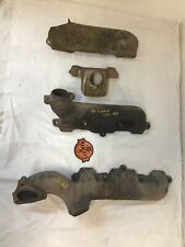 67-81 Oldsmobile 307-330-350-403 exhaust manifolds and heat shields (oem) picture