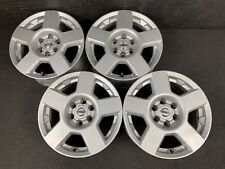 (4) Nissan Frontier Xterra Silver Wheels Rims + Caps 16