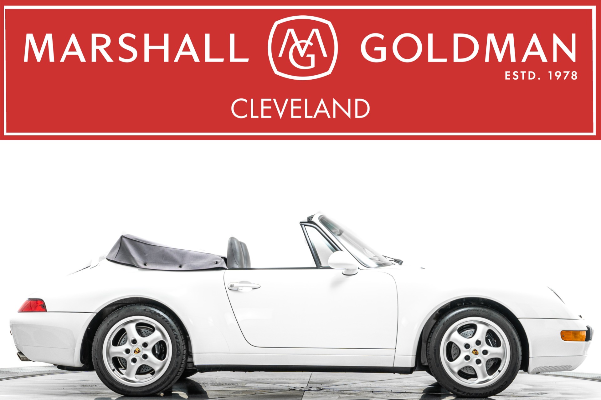 View this 1995 Porsche 911 Carrera Cabriolet -6 Speed Manual, Very Low Miles for sale at Marshall Goldman Motorcars 1995 Porsche 911 Carrera Cabriolet -6 Speed Manual, Very Low Miles for sale - $159,900 at Marshall Goldman Motorcars in Cleveland