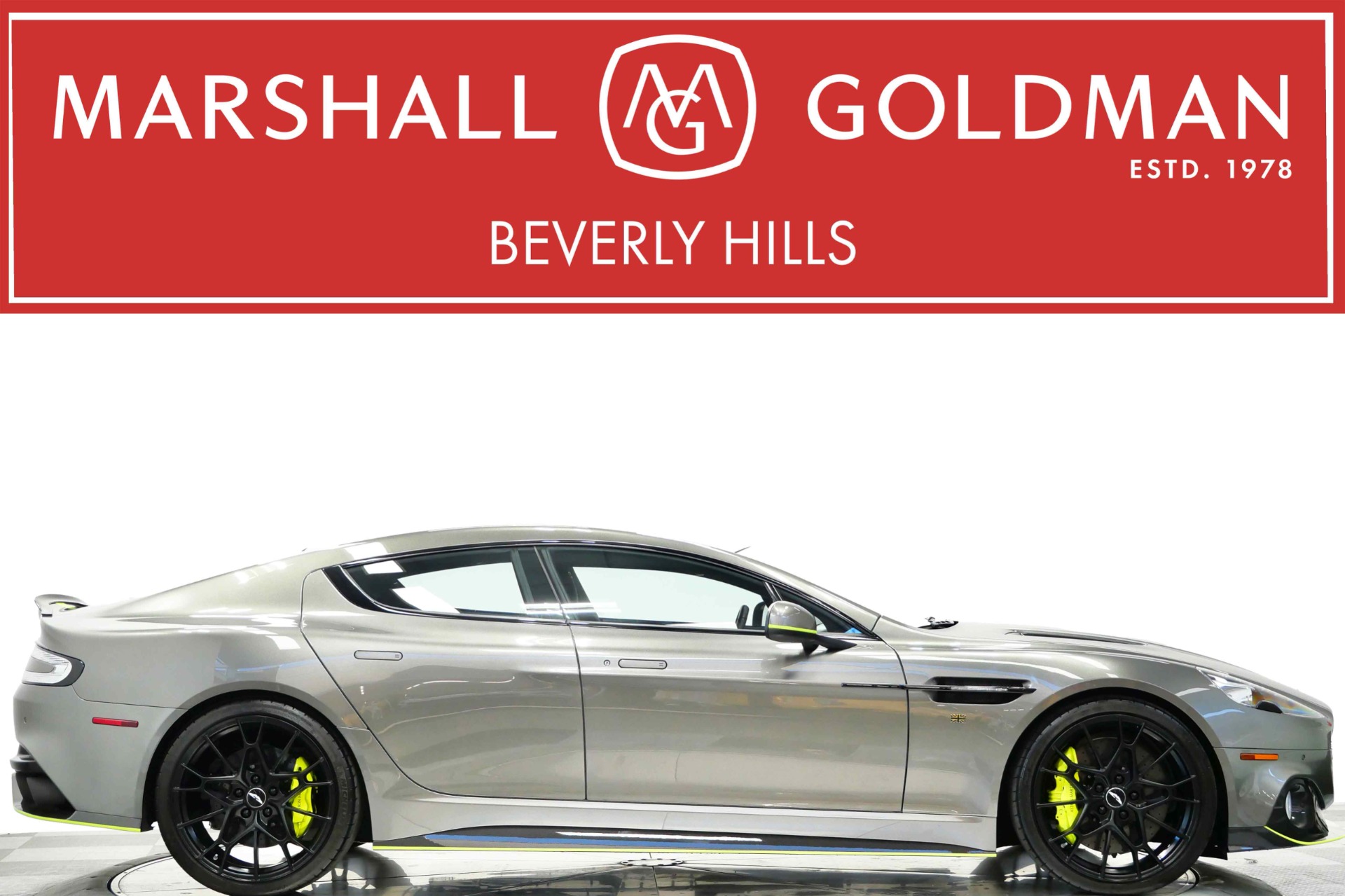 View this 2019 Aston Martin Rapide AMR -One of 220 Built, V12 Power, Lime Essence Accents for sale at Marshall Goldman Motorcars 2019 Aston Martin Rapide AMR -One of 220 Built, V12 Power, Lime Essence Accents for sale - $175,900 at Marshall Goldman Motorcars in Beverly Hills