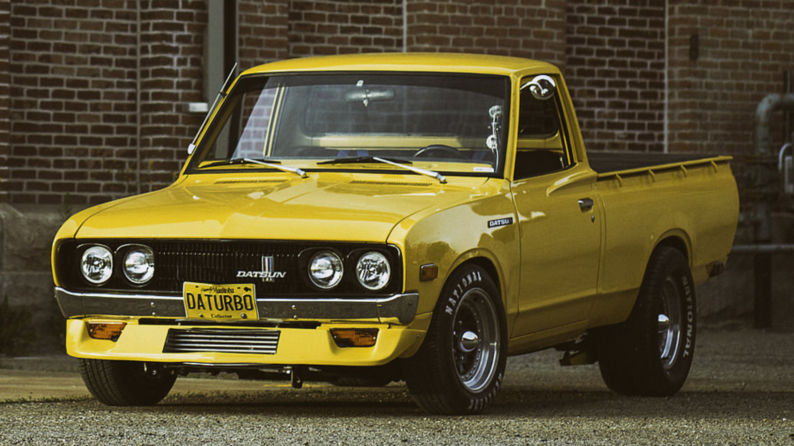 Yellow 1977 Datsun Pickup Sportruck