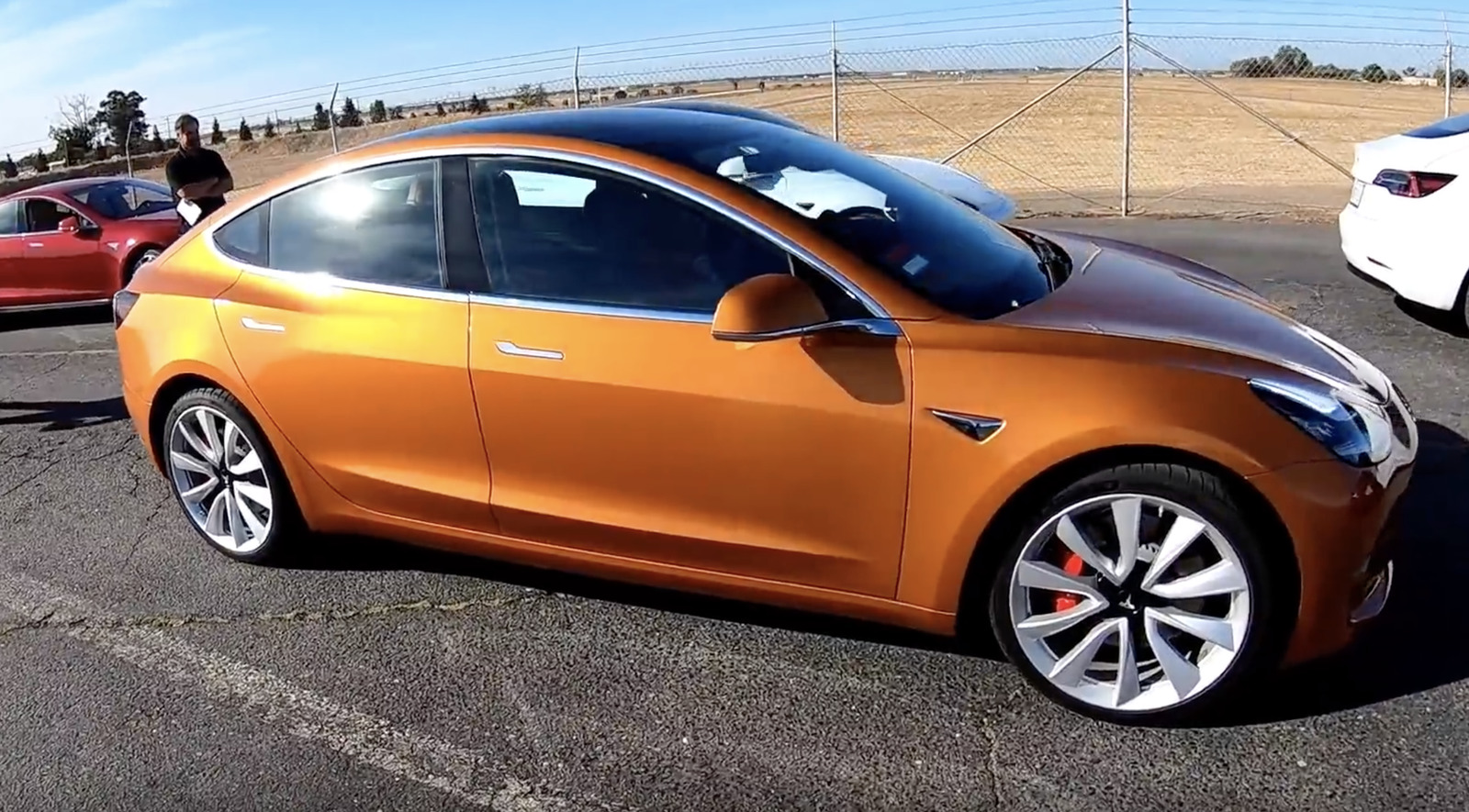2018 orange Tesla Model 3 Dual Motor Performance picture, mods, upgrades