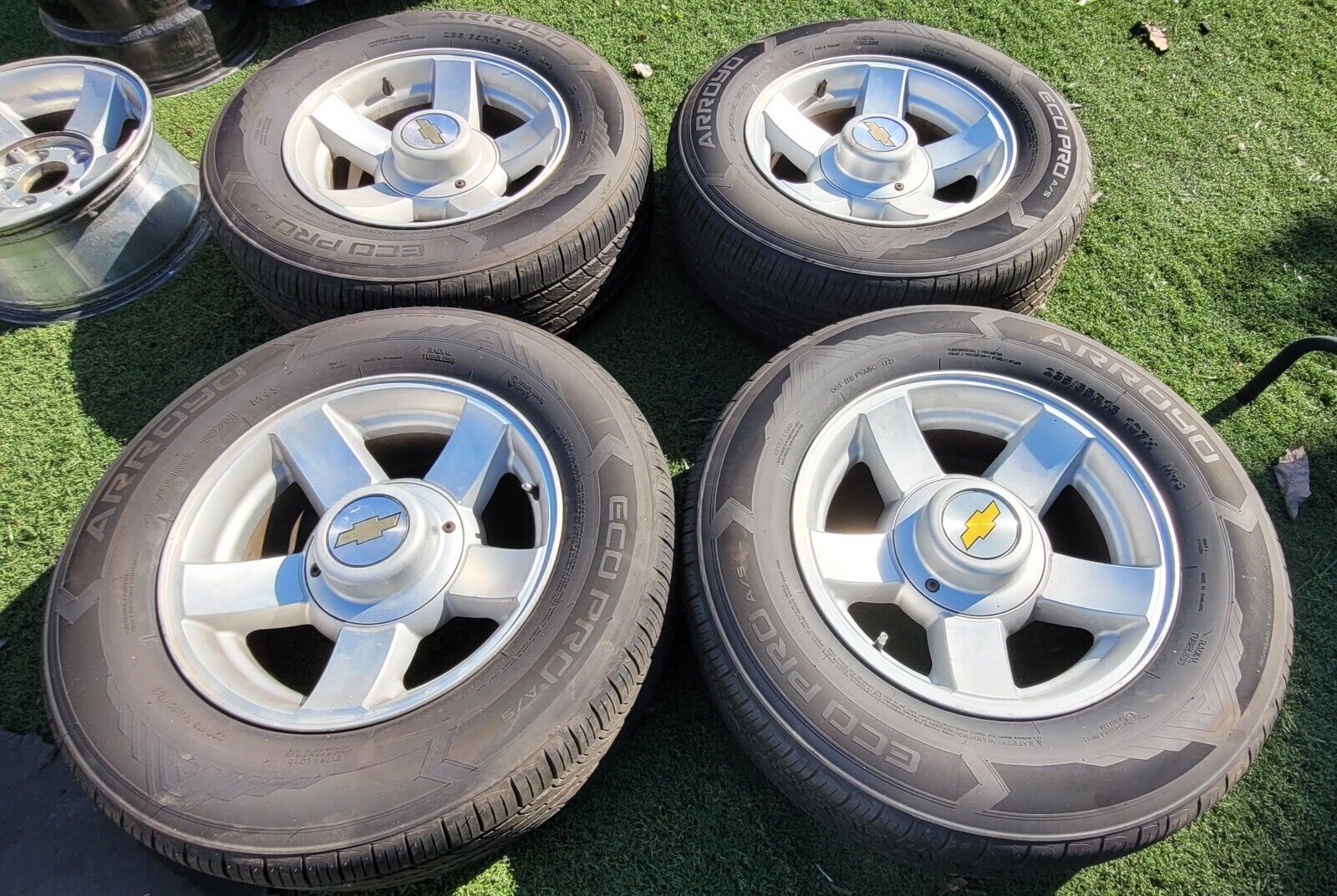 16x7 OEM Tahoe Limited Edition wheels 5x5 Chevy rims tires 235/65R16 Silverado