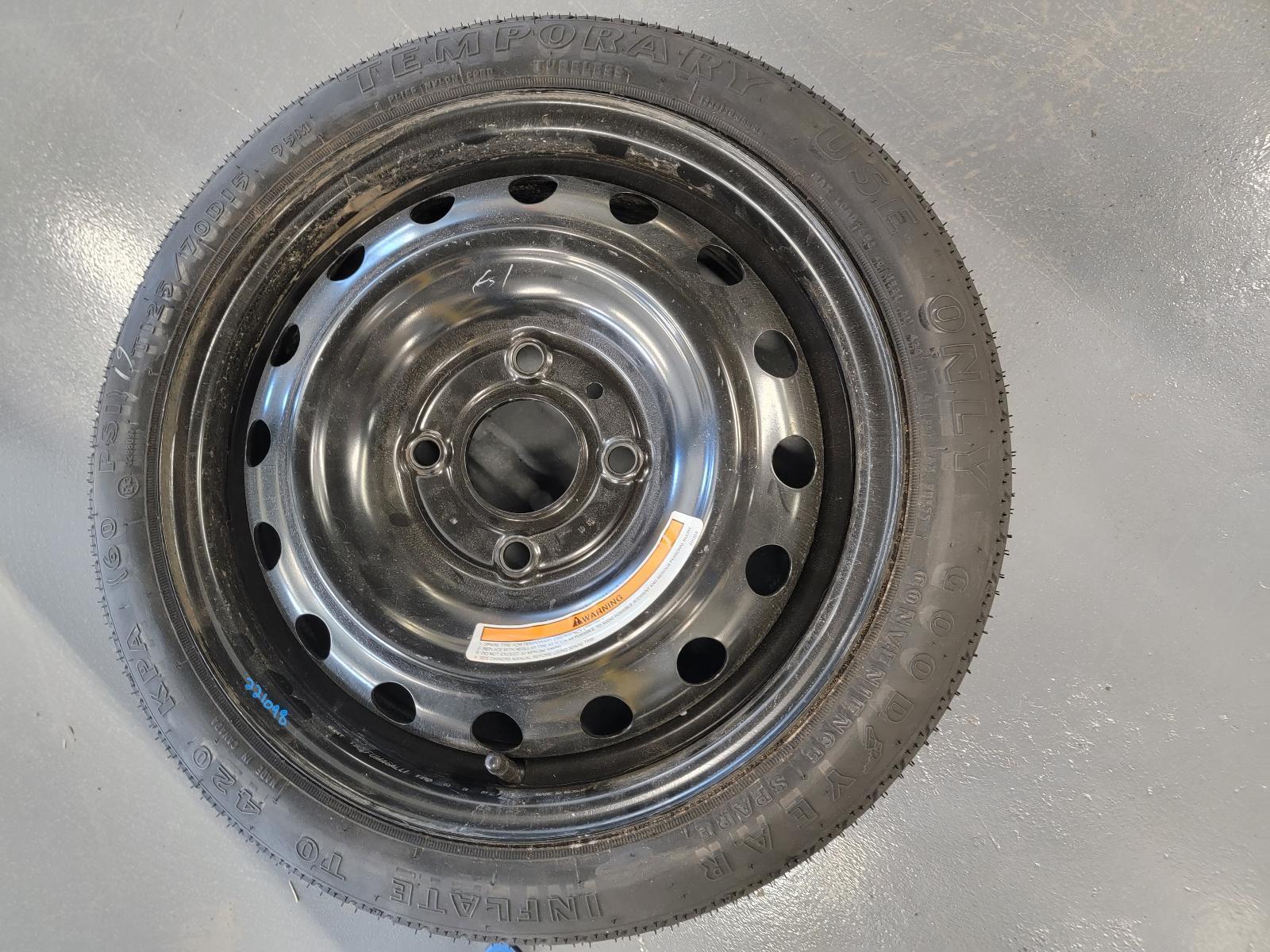 '07-'12 NISSAN VERSA Wheel 15x4 compact spare w/tire OEM