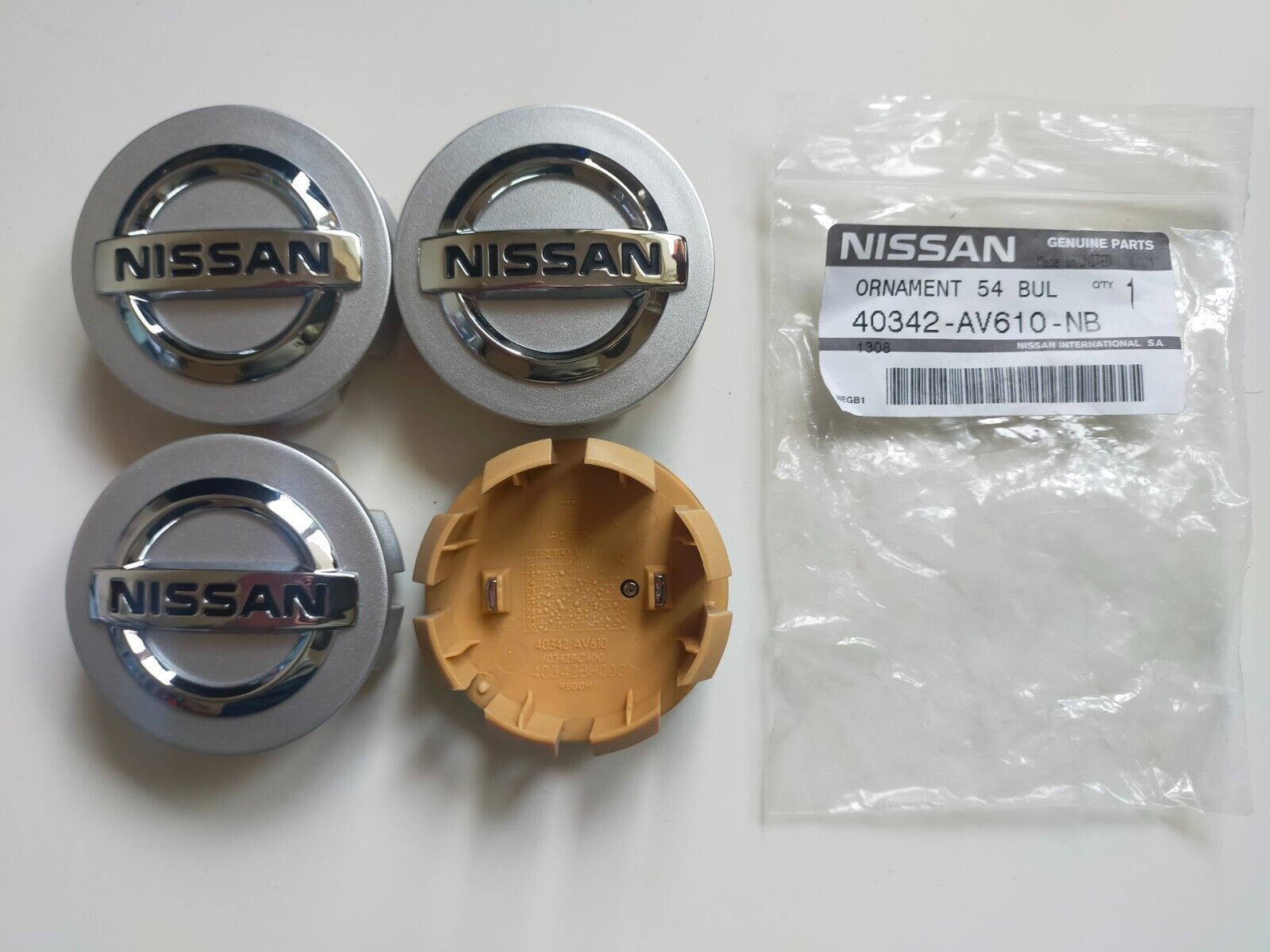 Nissan Micra Note Almera Alloy Wheel Centre Caps x 4pcs   pt no 40342-AV610-NB