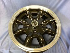 ONE SINGLE MG MIDGET SPRITE  5 X 13 BLACK PAINTED  WHEEL WITH POLISHED RIM picture