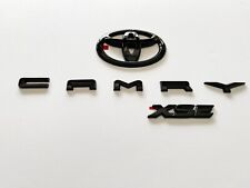 3PS 2018-2023 TOYOTA CAMRY XSE Gloss Black EMBLEM OVERLAY KIT  PT948-03190-02 picture